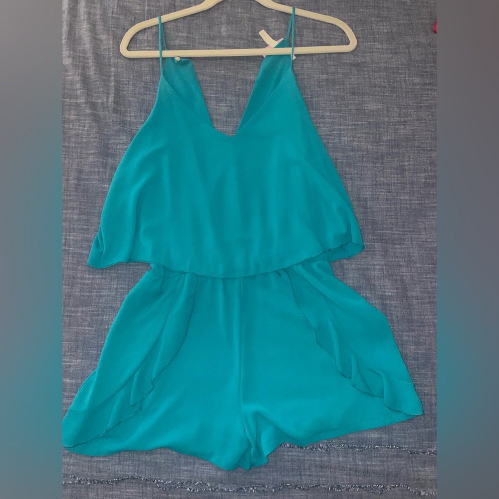 Teal One Piece Romper. Never worn. Tags still on